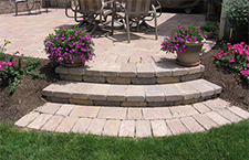 Paver patio with arcing steps