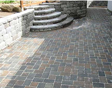 Cobblestone style paver walkway with curved stairs