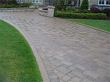 Gray paver driveway with edging