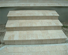 Steps made of pale yellow paver bricks