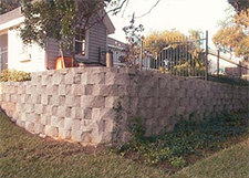 Pink paver retaining wall