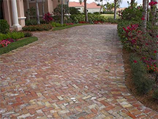 Driveway made of red and white brick pavers
