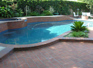 Pool with red brick pavers